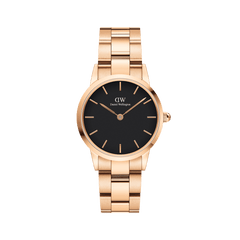 Daniel Wellington Iconic Link Black Rose Gold watch with a round black dial, slim rose gold hour markers, and a rose gold stainless steel bracelet, designed for both men and women.