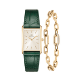 Rectangular gold-framed watch with a champagne sunray dial and deep green crocodile-embossed leather strap, paired with a gold crystal link bracelet featuring an adjustable chain and sparkling crystal detail.
