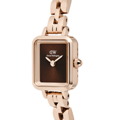 Quadro Mini Arch 3-link Amber Sunray Rose Gold watch with a close-up view of its rectangular brown sunray dial, polished rose gold case, and smooth 3-link bracelet, showcasing its minimalist design and premium finish.