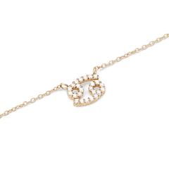 Close-up of the Crystal Zodiac Chain Necklace Gold featuring a Cancer zodiac pendant encrusted with sparkling crystals on a fine gold chain.