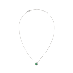Silver necklace with a fine chain featuring a round green jade pendant framed by white cubic zirconia crystals, offering a minimalist and elegant look.