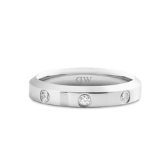 Classic Lumine Ring Silver 4 mm with a polished silver band, featuring three visible cubic zirconia stones set evenly around the surface for a clean, modern finish.