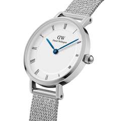 Close-up of the Petite Roman Numerals Sterling ladies watch featuring a white dial with Roman numerals, blue steel hands, and a slim silver mesh strap, highlighting its minimalist and elegant design.