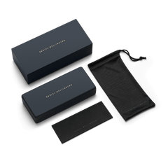 Branded Daniel Wellington sunglasses case, cleaning cloth, and soft pouch in navy and black, designed for safe storage and easy care of Ambler Steel Rose Gold sunglasses.