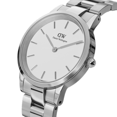 Daniel Wellington Iconic Link Silver watch with a polished stainless steel bracelet, minimalist eggshell white dial, and slim silver hour markers, shown from an angled side view.