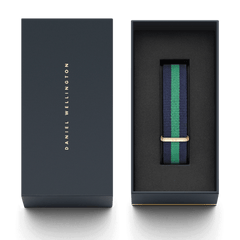 Warwick Strap Rose Gold with navy and green stripes and a rose gold buckle, presented in a premium Daniel Wellington gift box, ideal for gifting or updating your watch collection.