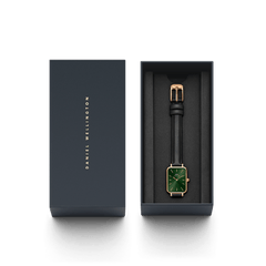 Quadro Pressed Sheffield Emerald Rose Gold watch presented in a sleek Daniel Wellington gift box, featuring a rectangular rose gold case, emerald green dial, and black leather strap, ideal for gifting or adding to your collection.