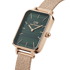 Quadro Pressed Melrose Green Rose Gold watch with a rectangular green dial, rose gold mesh bracelet, and minimalist hour markers, shown in a close-up to highlight its refined design and premium finish.