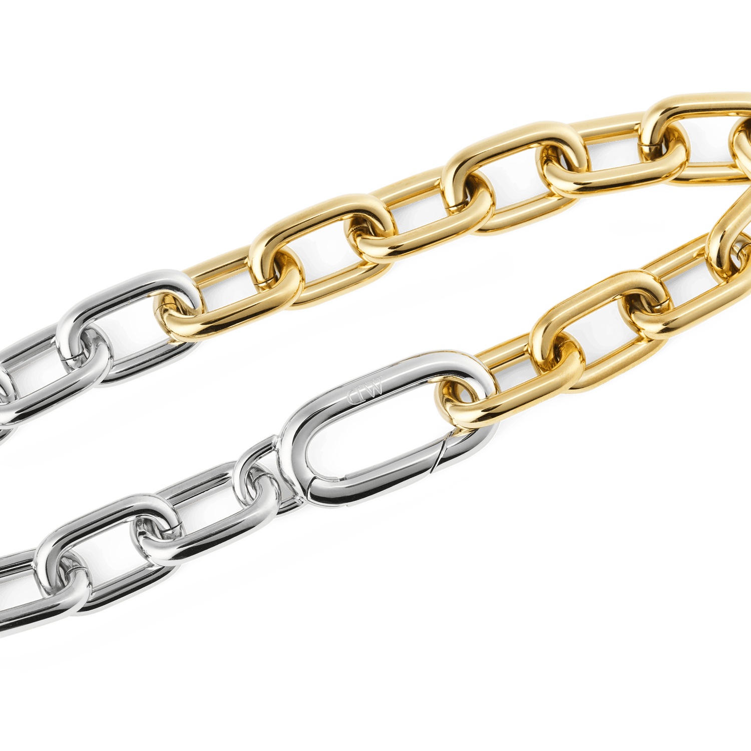 Close-up of the Contrast Link Bracelet Two Tone Gold, highlighting the polished gold and silver rectangular links and the seamless clasp detail.