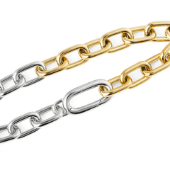 Close-up of the Contrast Link Bracelet Two Tone Gold, highlighting the polished gold and silver rectangular links and the seamless clasp detail.