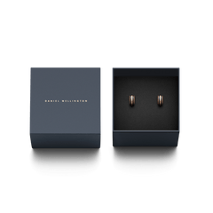 Emalie Earrings Rose Gold Black displayed in an elegant Daniel Wellington gift box, featuring petite huggie earrings with rose gold and black enamel detailing, ideal for gifting or adding a refined touch to any jewellery collection.