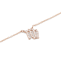 Rose gold chain necklace featuring a Virgo zodiac pendant adorned with sparkling crystals, crafted from stainless steel for a refined and modern look.