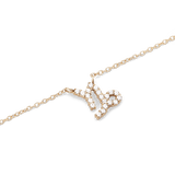 Close-up of the Crystal Zodiac Chain Necklace Gold featuring a Capricorn pendant set with sparkling crystals on a fine gold chain, highlighting its elegant and modern design.