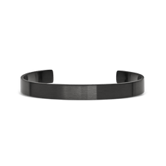 A minimalist graphite cuff bracelet with a brushed finish, featuring a slim 7 mm width and open design for easy adjustment and comfortable everyday wear.