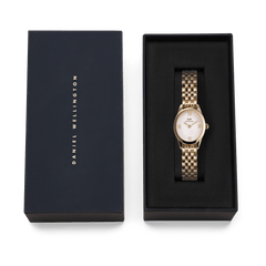 Ophelia Mini Gold women’s watch with a gold oval case and polished link bracelet, presented in a branded Daniel Wellington gift box, ideal for gifting or special occasions.