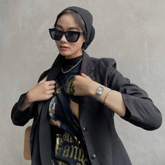 Quadro Pressed Unitone Silver ladies watch with a rectangular brushed silver dial and mesh strap, styled with a graphic tee, black blazer, and silver accessories for a contemporary urban look.