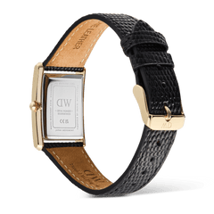 Rear view of the Bound Black Lizard Guilloché Gold watch showing the engraved stainless steel case back, gold-toned pin buckle, and textured black lizard grain leather strap with tan lining, highlighting the quality craftsmanship and adjustable fit.