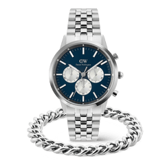 A silver Daniel Wellington chronograph men's watch with a blue dial and silver subdials is paired with a polished Ellipse Cuban Chain Bracelet, both featuring a matching stainless steel finish for a cohesive and modern look.