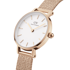Close-up of the Petite Pressed Melrose Rose Gold watch featuring a rose gold mesh strap, minimalist eggshell white dial, and slim 24mm case, highlighting its elegant and modern design for women.