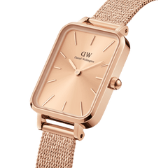 Close-up of the Quadro Pressed Unitone rose gold watch, showing its rectangular case, minimalist dial, and pressed mesh strap, crafted for women who appreciate understated elegance and reliable quality.