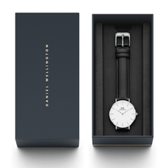 Petite Sheffield Silver ladies watch with a black leather strap and minimalist white dial, elegantly presented in a branded Daniel Wellington gift box.
