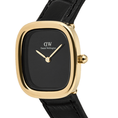 Margot Reading Onyx Ceramic Gold ladies watch with a polished gold-tone rectangular case, minimalist black ceramic dial, and black croco-embossed leather strap, highlighting its slim and elegant profile.