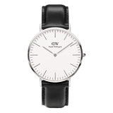 Classic Sheffield Silver watch with a polished silver case, minimalist eggshell white dial, slim silver hands, and a black genuine leather strap, shown from the front against a plain background.