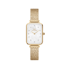 Quadro Lumine Pressed Piano White MoP Gold ladies watch featuring a rectangular gold case, real mother of pearl dial with crystal indexes, and a textured gold piano link bracelet.