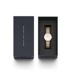 Petite Lumine Pressed Evergold gold mesh strap watch with an eggshell white dial and crystal markers, elegantly presented in a black Daniel Wellington gift box.