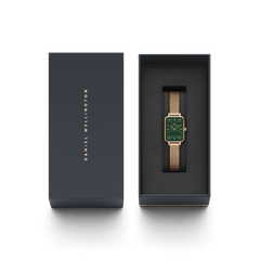 Quadro Pressed Melrose Green Rose Gold watch with a rectangular green dial and rose gold mesh bracelet, presented in a sleek Daniel Wellington gift box, ideal for gifting or special occasions.