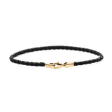 Slim black braided leather bracelet with a polished gold-plated stainless steel clasp, showcasing a minimalist and refined design suitable for men's everyday or formal wear.
