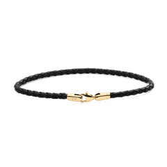 Slim black braided leather bracelet with a polished gold-plated stainless steel clasp, showcasing a minimalist and refined design suitable for men's everyday or formal wear.