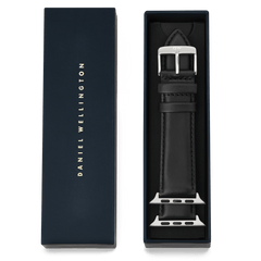 Smartwatch Leather Strap Sheffield Silver presented in a Daniel Wellington gift box, featuring smooth black Sheffield leather, subtle stitching, and a polished silver pin buckle with Apple Watch connectors.