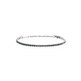 Slim silver tennis bracelet featuring a row of deep, dark Preciosa crystals set in polished stainless steel, with an adjustable chain and secure lobster clasp for a comfortable fit.