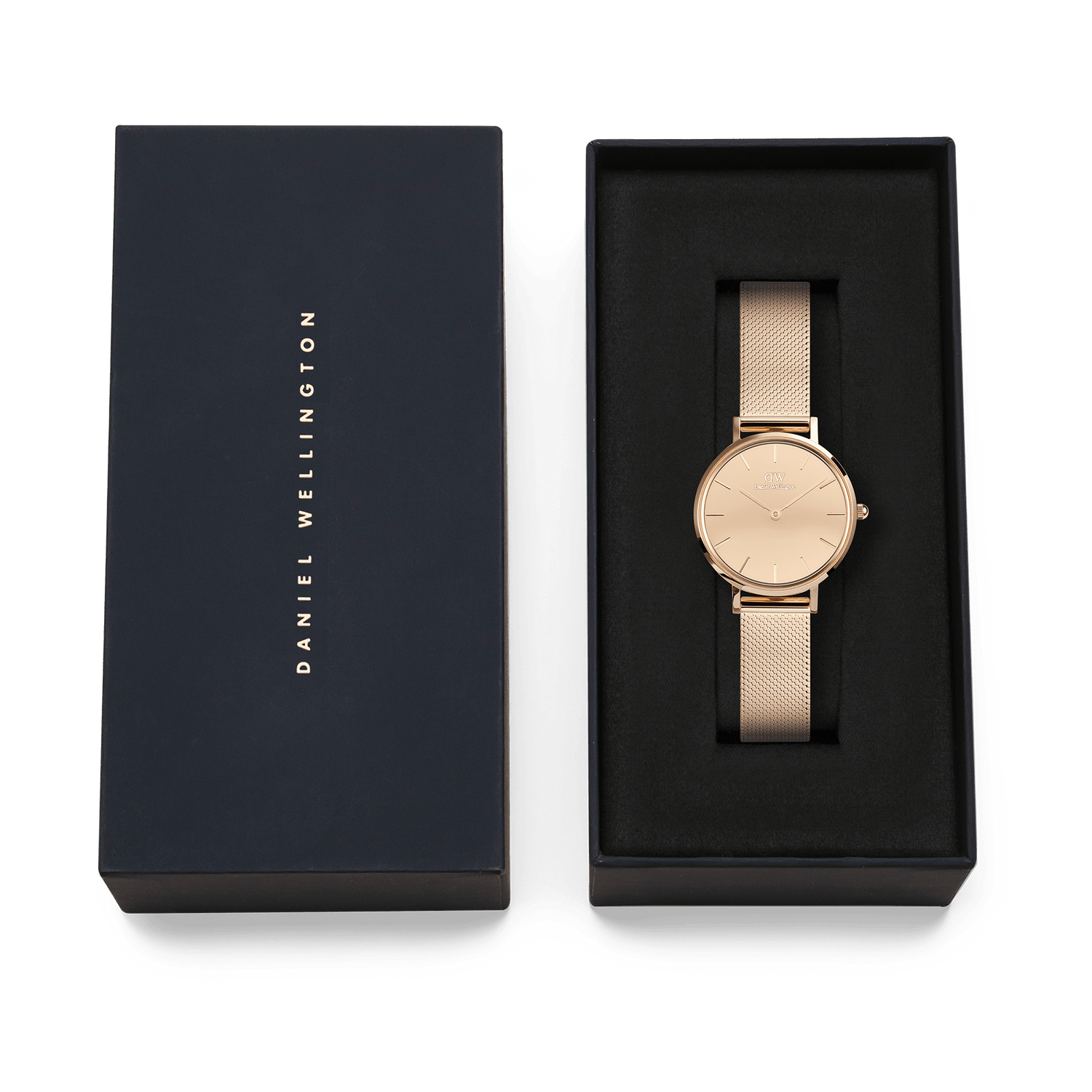 Petite Reflection Rose Gold watch by Daniel Wellington displayed in an elegant black gift box, featuring a slim rose gold mesh strap and minimalist mirror-effect dial.