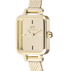 Close-up of the Quadro Mini Reflection Gold watch showing its polished rectangular gold case, minimalist mirror-effect dial, and fine gold mesh strap, highlighting its elegant and refined detailing.