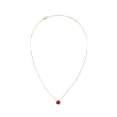 Gold necklace with a fine adjustable chain, featuring a domed red agate pendant surrounded by a halo of white cubic zirconia crystals. The elegant design highlights the vibrant red stone and polished gold finish.