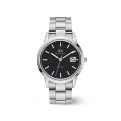 Daniel Wellington Iconic Link Automatic watch with a black dial, luminous hour markers, and a magnified date window, set in a polished stainless steel bracelet and 40mm case.