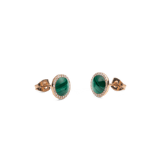 Audrey Earrings Malachite Rose Gold shown from the side, highlighting the domed green malachite centre, rose gold setting, and halo of white cubic zirconia with secure butterfly clasps.