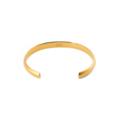 Arch Cuff Gold 6mm displayed from above, showing its open-ended, polished gold design with a smooth, rounded profile and subtle inner logo detail.