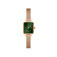 Quadro Mini Melrose Emerald features a slim rectangular case with an emerald green dial and a rose gold mesh bracelet, offering a minimalist and elegant look suitable for everyday wear.