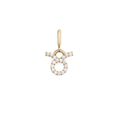 Gold Taurus zodiac watch charm adorned with sparkling cubic zirconia crystals, featuring a classic round and horned design in a secure claw setting for versatile styling with watches or bracelets.