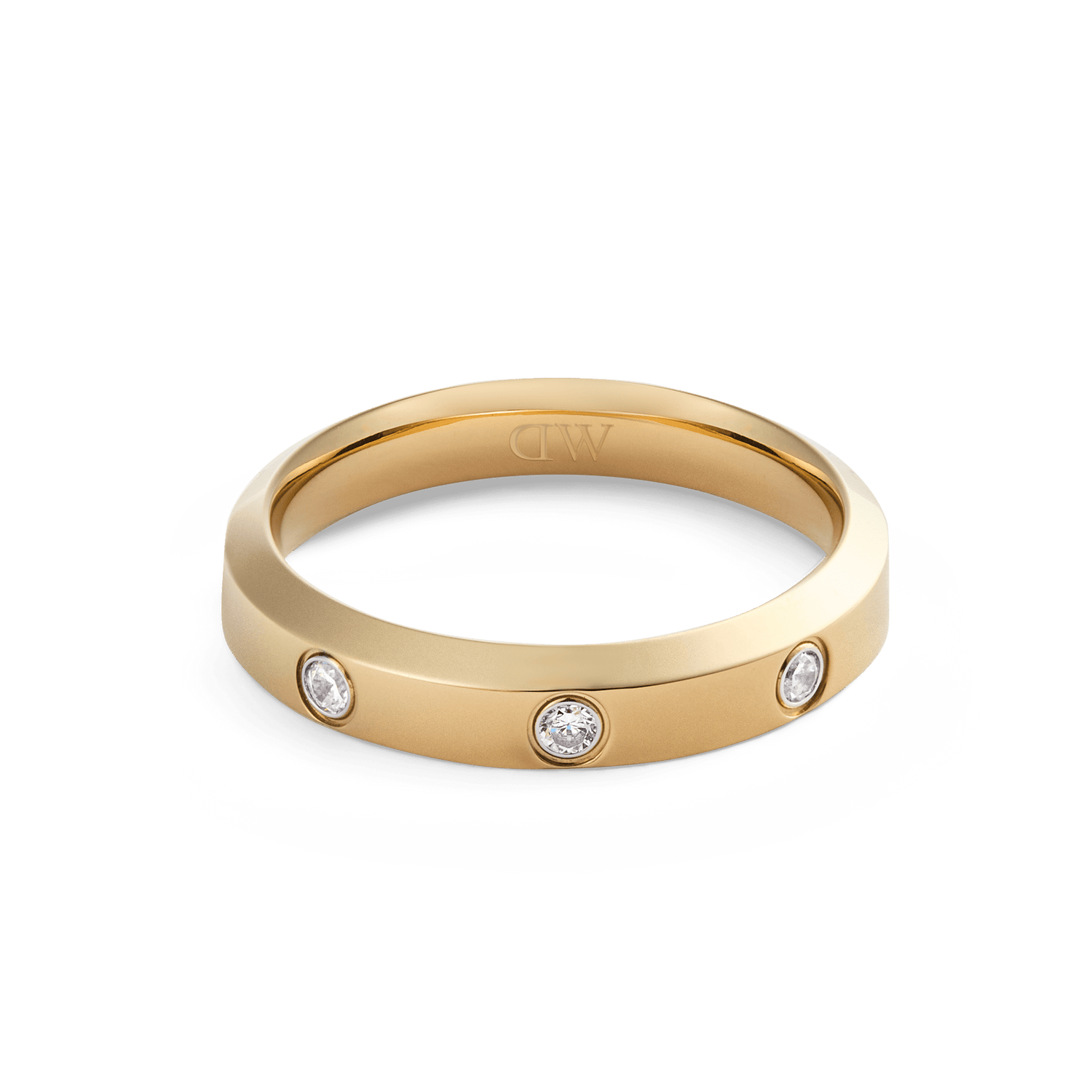 Classic Lumine Ring Gold 4 mm with a smooth gold band, featuring three round cubic zirconia crystals set evenly along the front for a refined, minimalist look.