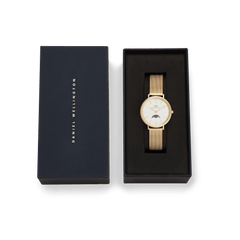 Petite Lune Evergold ladies gold watch with a mesh strap and moon-phase dial, presented in a sleek black Daniel Wellington gift box, ideal for gifting or special occasions.