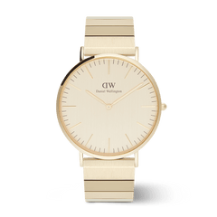 Classic Piano Link Gold Unitone men’s watch with a brushed gold 40mm dial, minimalist face, and a modern geometric piano link bracelet in matching gold tone.