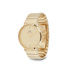 Classic Piano Link Gold Unitone men’s watch with a brushed gold dial, minimalist markers, and a geometric piano link bracelet, shown at an angle to highlight its slim profile and polished gold finish.