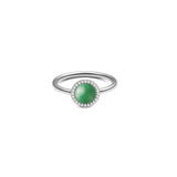 Audrey Ring Jade Silver with a slim silver band, featuring a round green jade centrepiece framed by a halo of sparkling white cubic zirconia for a modern, elegant finish.