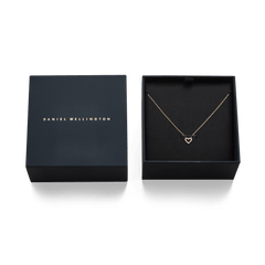 Mirelle Heart Necklace Rose Gold displayed in an elegant Daniel Wellington gift box, featuring a delicate rose gold chain and open heart pendant with sparkling cubic zirconia stones.