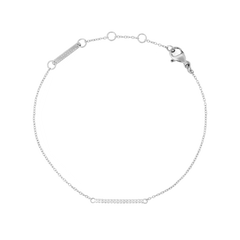 Delicate Mirelle Eternity Bracelet Silver featuring a slim bar of white cubic zirconia crystals on a fine adjustable silver chain, designed for layering or everyday wear.