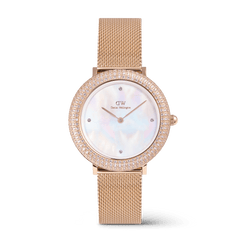 Rose gold ladies watch with a mesh strap, a shimmering crystal-set bezel, and a white mother of pearl dial featuring four crystal markers, designed for an elegant and versatile look.
